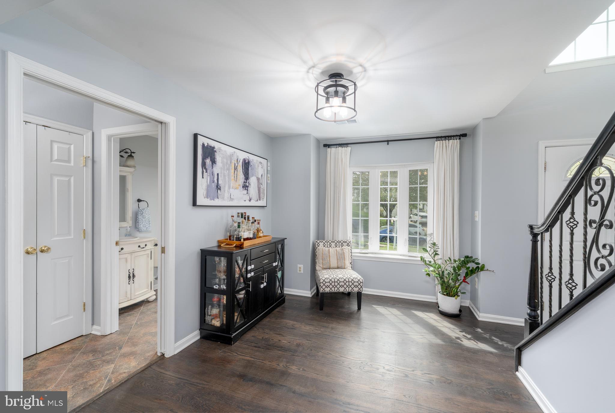 1346 Becket Road Eldersburg, MD 21784 - Photo 16 of 73 a living room with furniture and book shelf