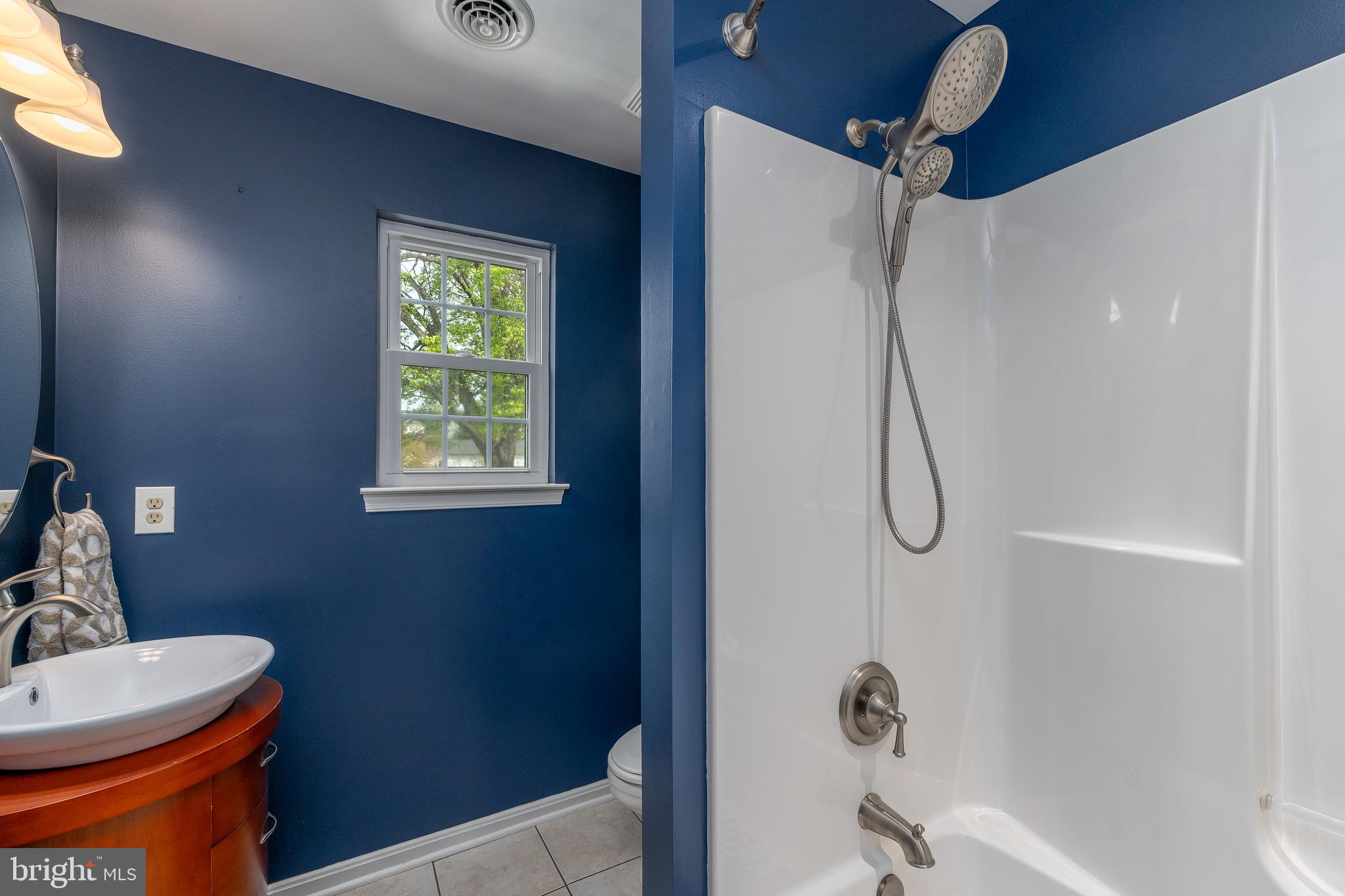 1346 Becket Road Eldersburg, MD 21784 - Photo 25 of 73 a bathroom with a sink a toilet and shower