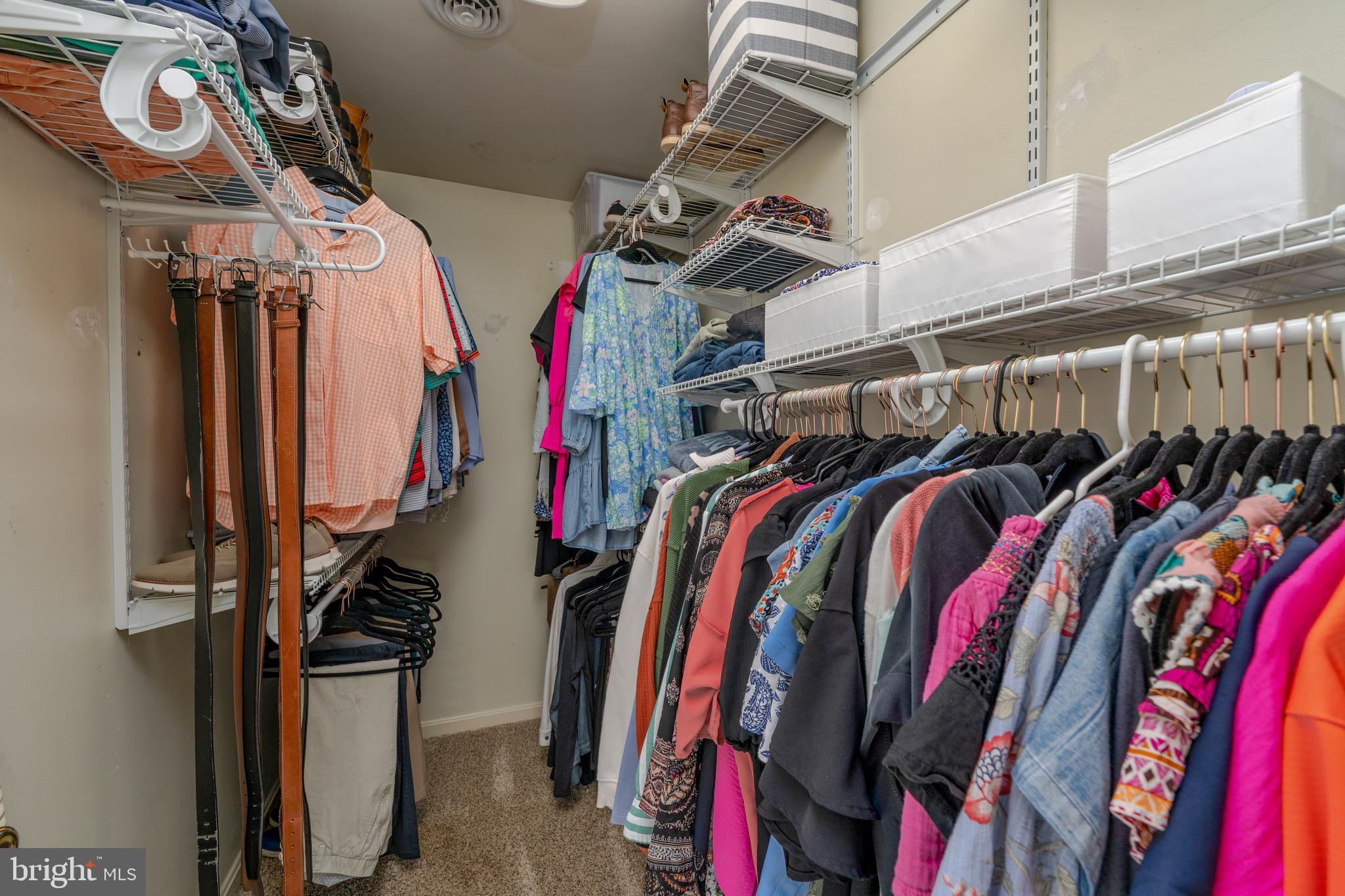 1346 Becket Road Eldersburg, MD 21784 - Photo 26 of 73 a view of walk in closet with clothes and shoes