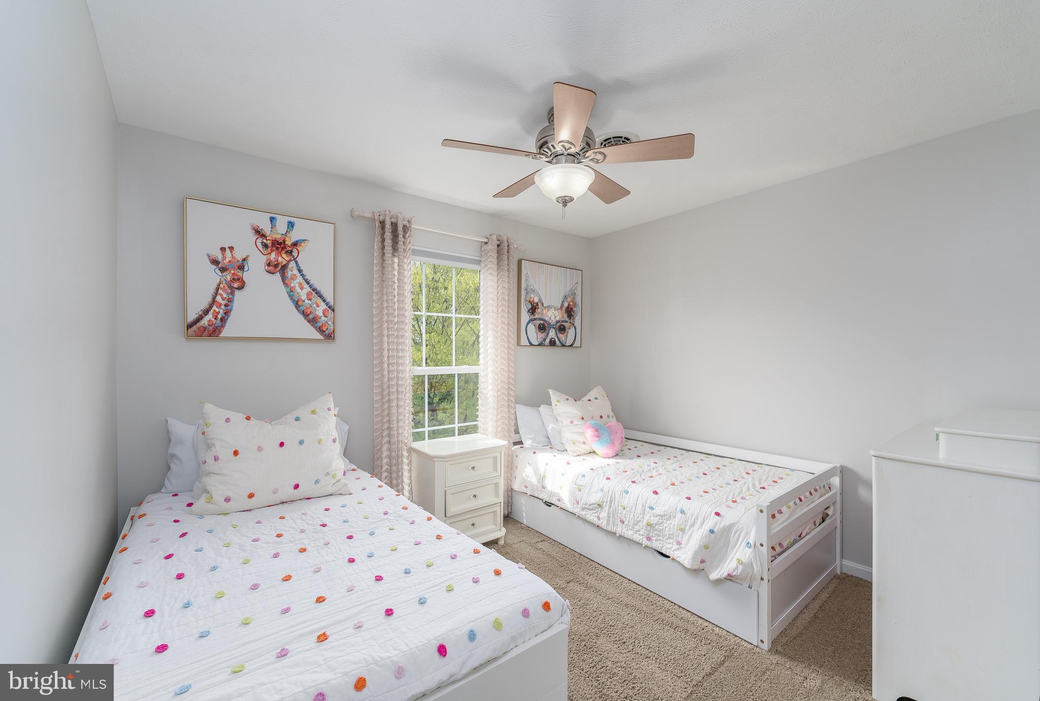 1346 Becket Road Eldersburg, MD 21784 - Photo 28 of 73 a bedroom with a large bed and a chandelier