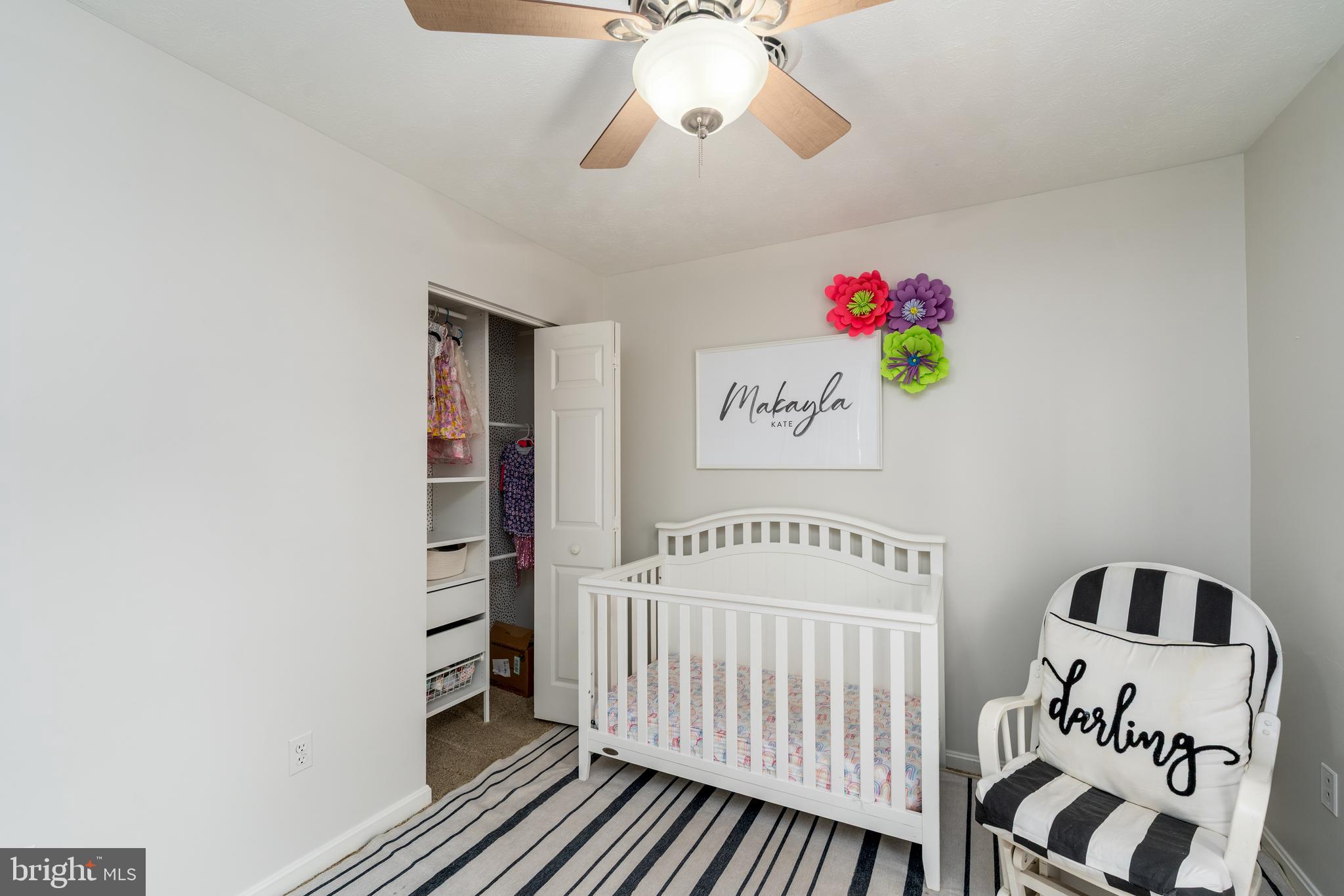 1346 Becket Road Eldersburg, MD 21784 - Photo 30 of 73 a bedroom with a bed and a chandelier