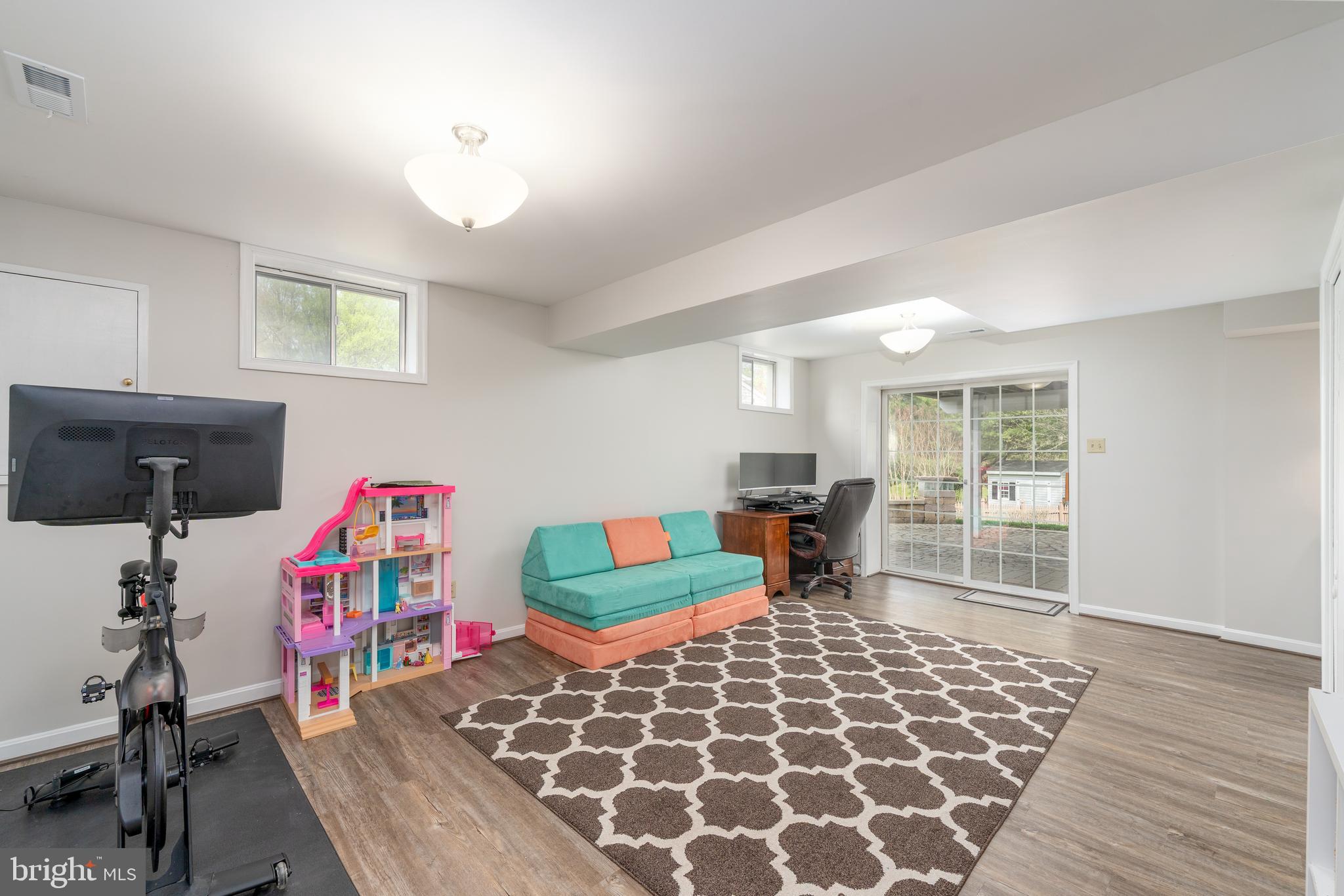 1346 Becket Road Eldersburg, MD 21784 - Photo 32 of 73 a bedroom with furniture and a wooden floor