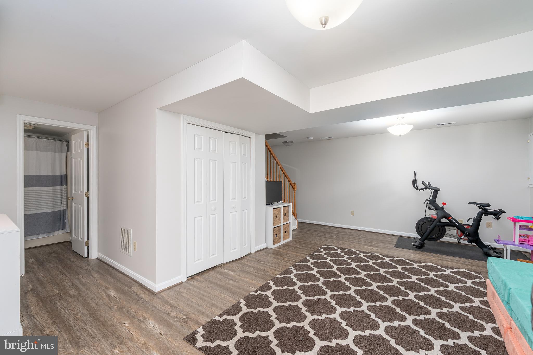 1346 Becket Road Eldersburg, MD 21784 - Photo 34 of 73 a view of a livingroom with wooden floor and a window