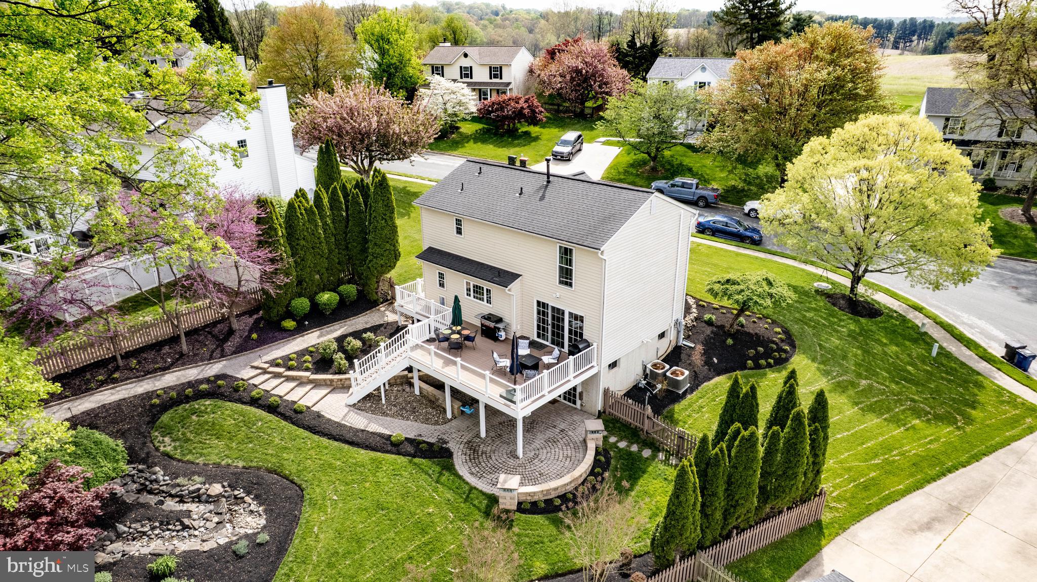 1346 Becket Road Eldersburg, MD 21784 - Photo 4 of 73 an aerial view of a house with a garden and lake view