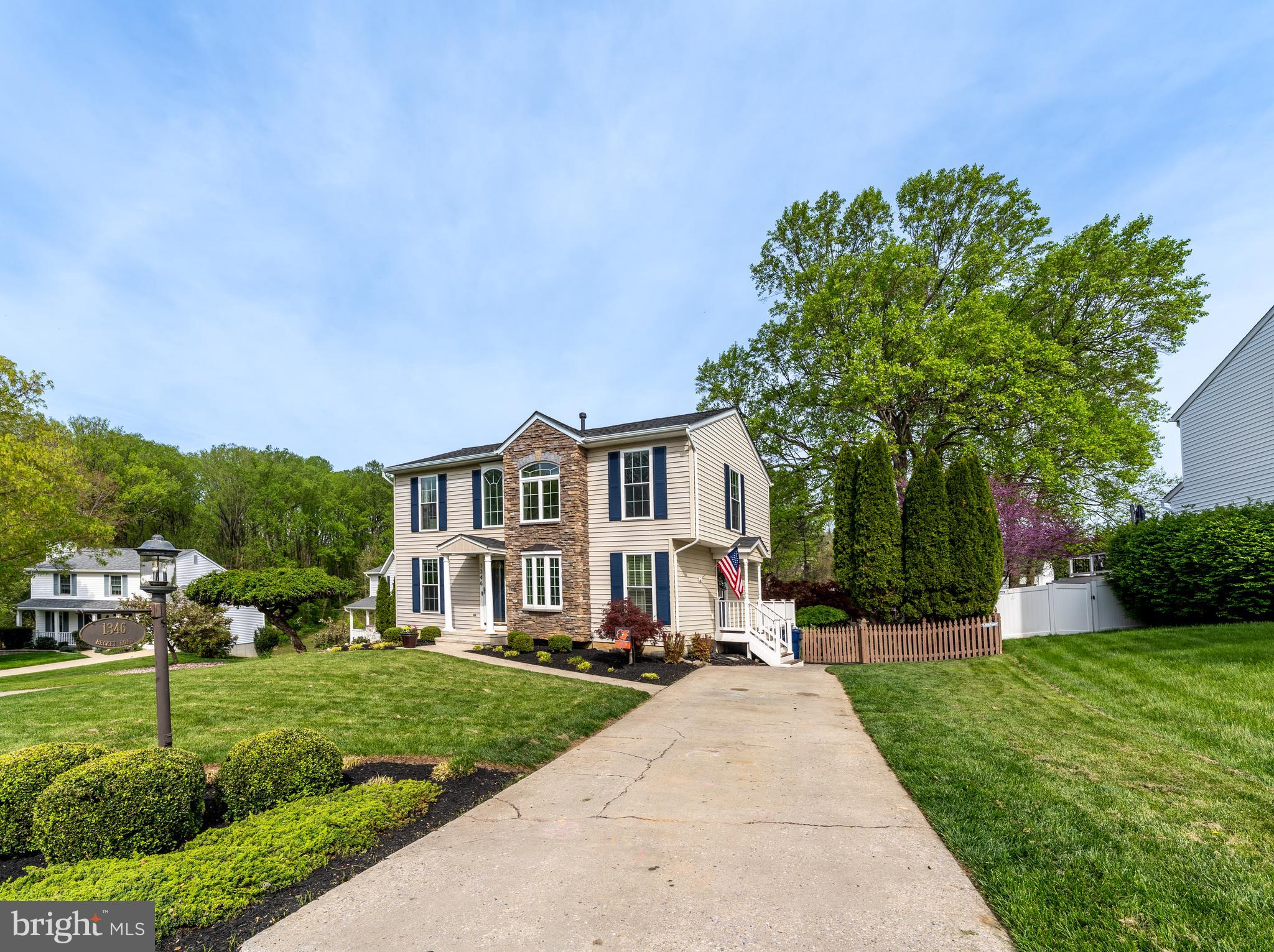 1346 Becket Road Eldersburg, MD 21784 - Photo 50 of 73 a front view of a house with a yard and green space