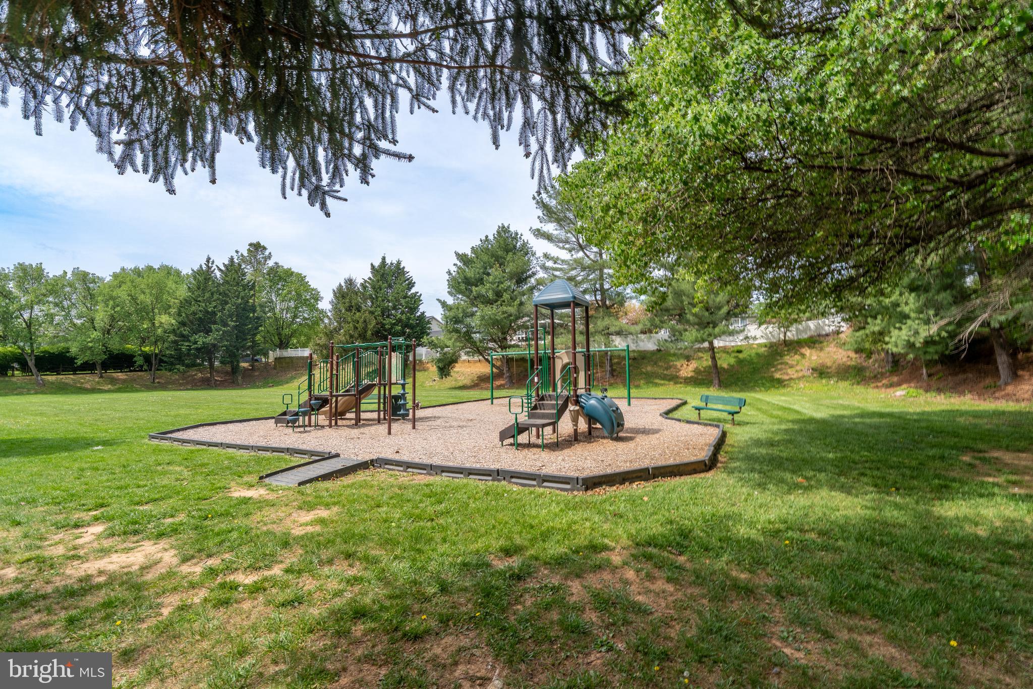 1346 Becket Road Eldersburg, MD 21784 - Photo 57 of 73 a view of a swimming pool with a garden
