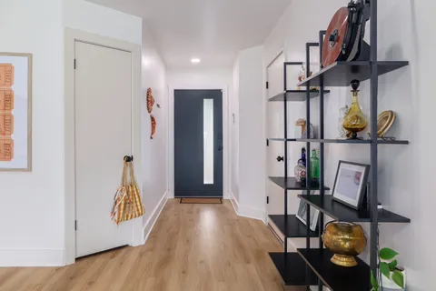 a bed room with a bed and a window