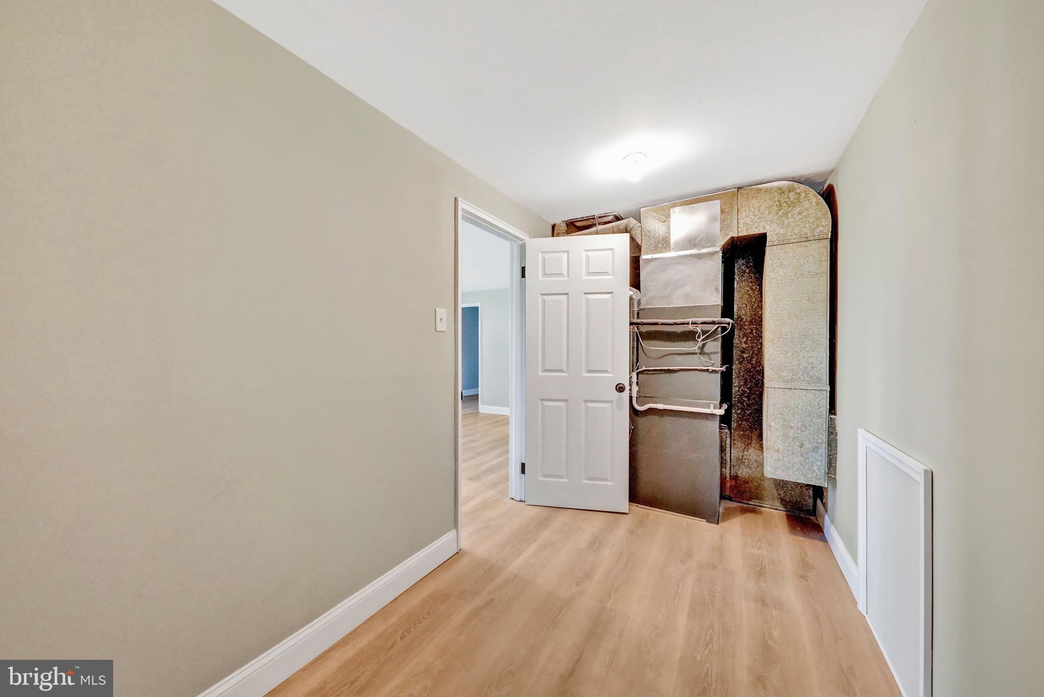 1538 Haddonfield-Berlin Road Cherry Hill, NJ 08003 - Photo 11 of 36 a view of a kitchen with a closet and electronic appliances