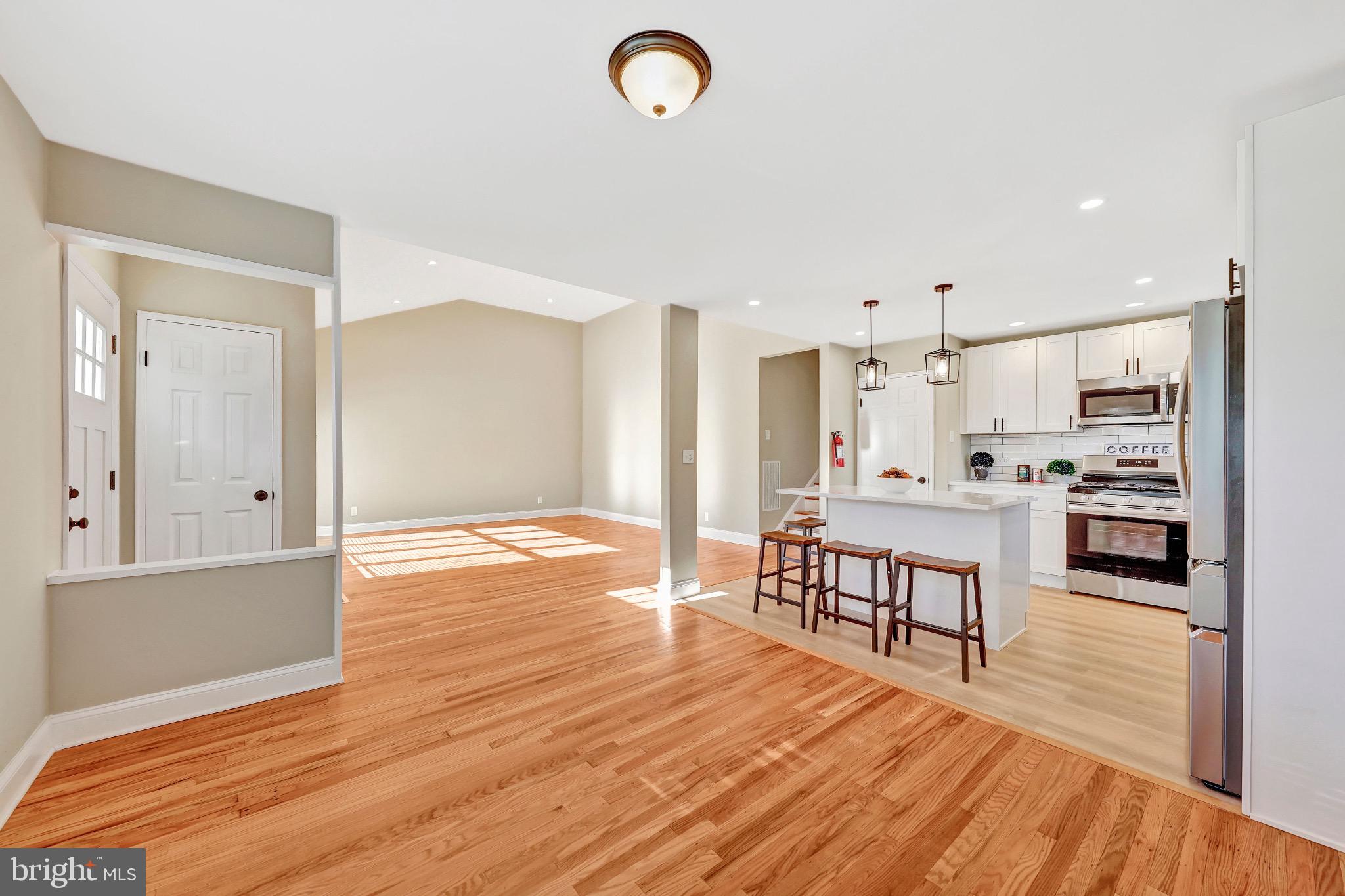 1538 Haddonfield-Berlin Road Cherry Hill, NJ 08003 - Photo 15 of 36 a view of kitchen with cabinets and wooden floor