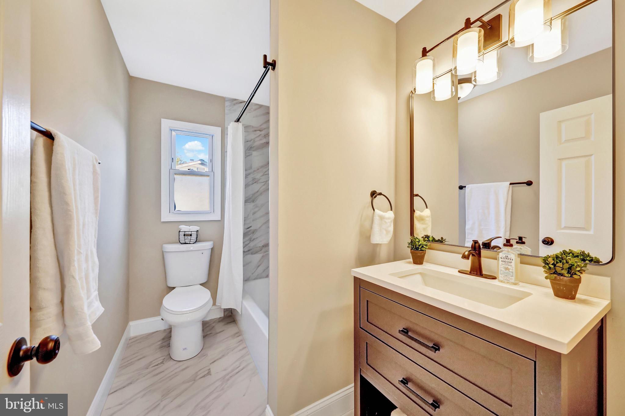 1538 Haddonfield-Berlin Road Cherry Hill, NJ 08003 - Photo 20 of 36 a bathroom with a sink toilet and shower