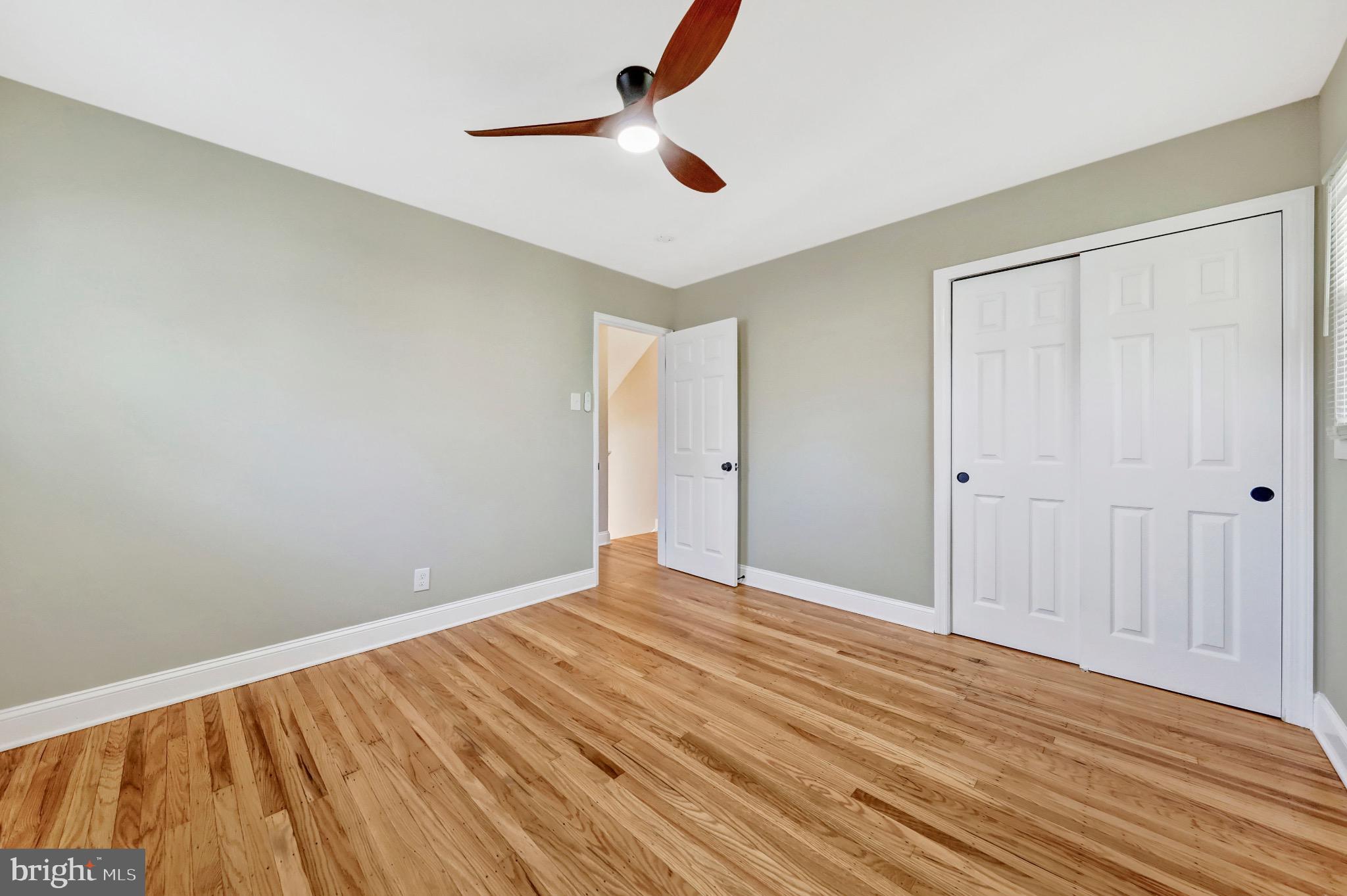 1538 Haddonfield-Berlin Road Cherry Hill, NJ 08003 - Photo 23 of 36 wooden floor in an empty room