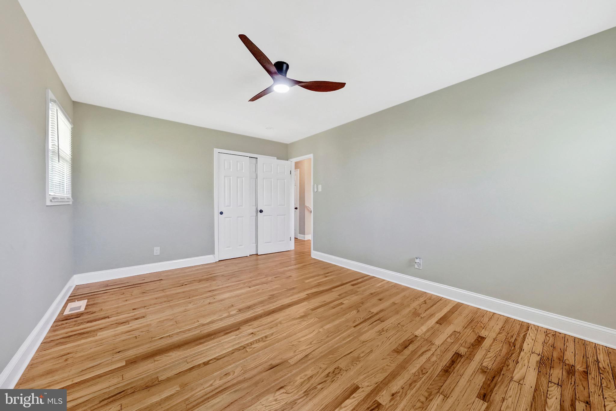 1538 Haddonfield-Berlin Road Cherry Hill, NJ 08003 - Photo 25 of 36 a view of empty room with wooden floor