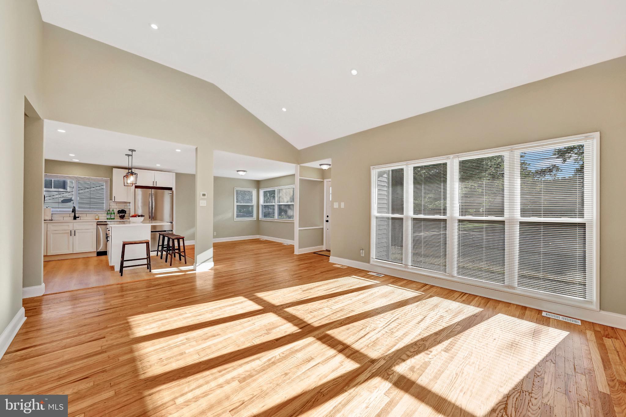 1538 Haddonfield-Berlin Road Cherry Hill, NJ 08003 - Photo 31 of 36 a view of a living room kitchen and a stove