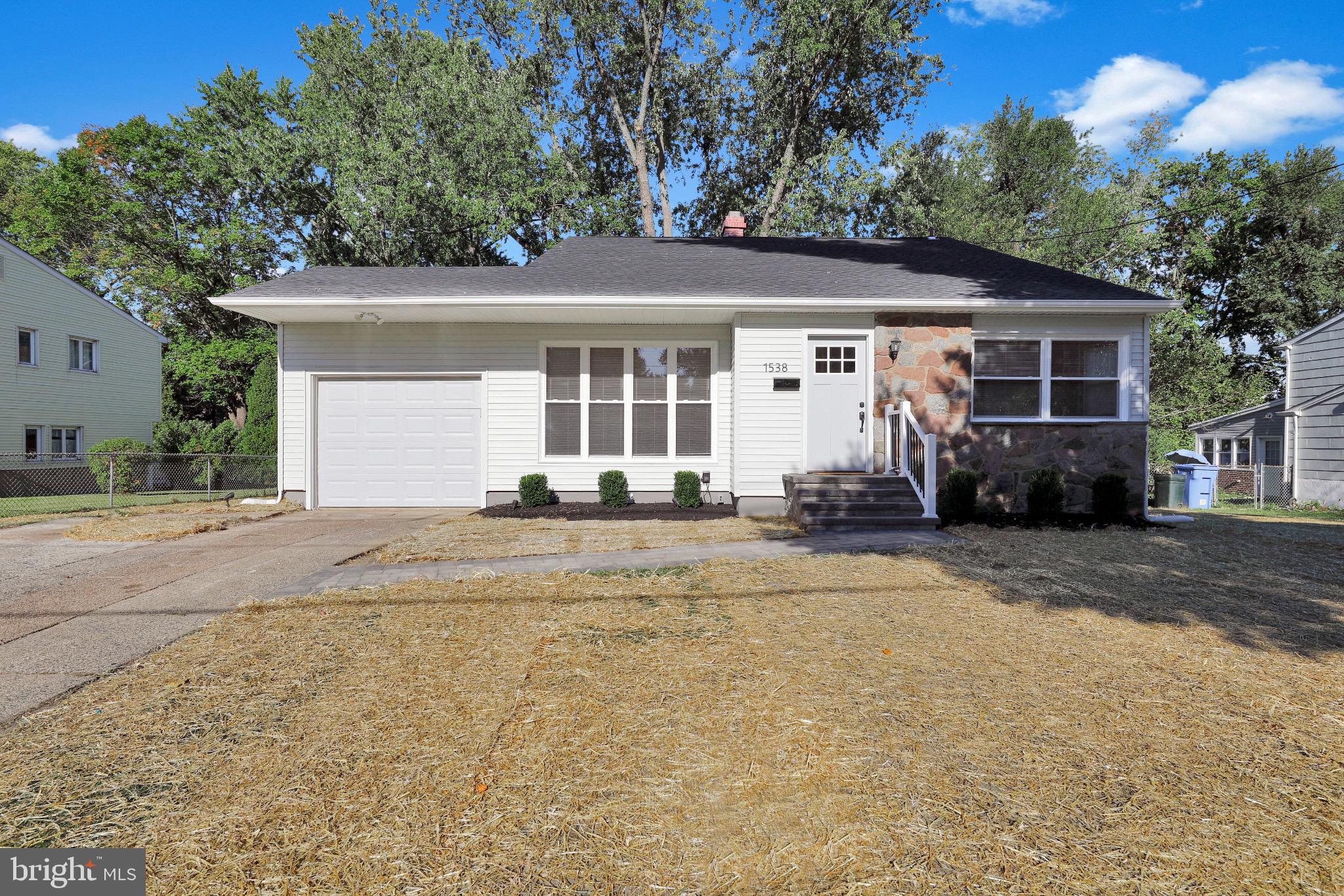1538 Haddonfield-Berlin Road Cherry Hill, NJ 08003 - Photo 6 of 36 front view of a house with a patio
