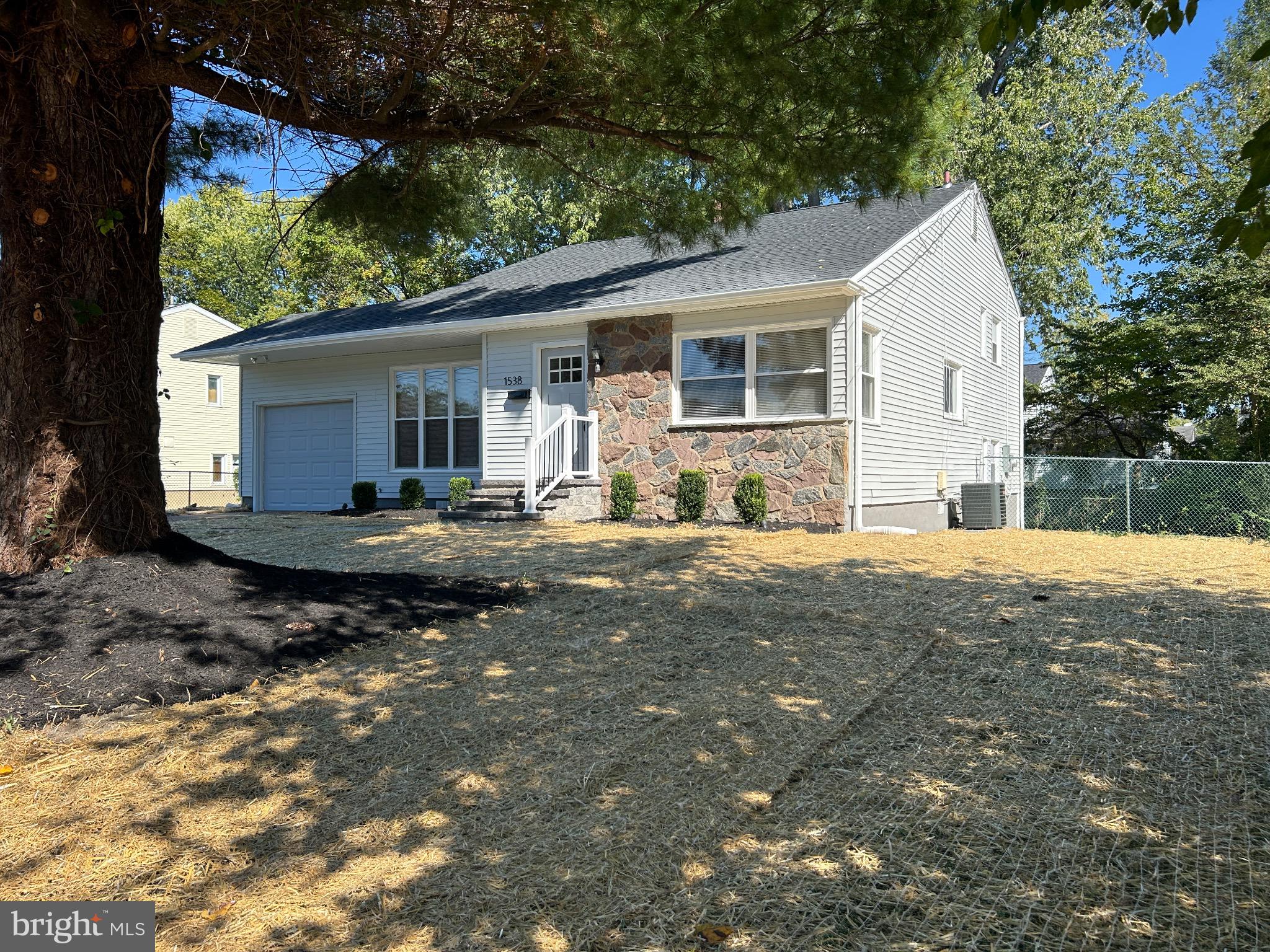 1538 Haddonfield-Berlin Road Cherry Hill, NJ 08003 - Photo 7 of 36 a backyard of a house with yard and outdoor seating