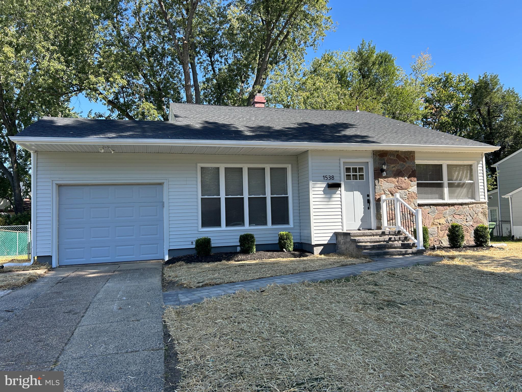 1538 Haddonfield-Berlin Road Cherry Hill, NJ 08003 - Photo 9 of 36 a front view of a house with garden