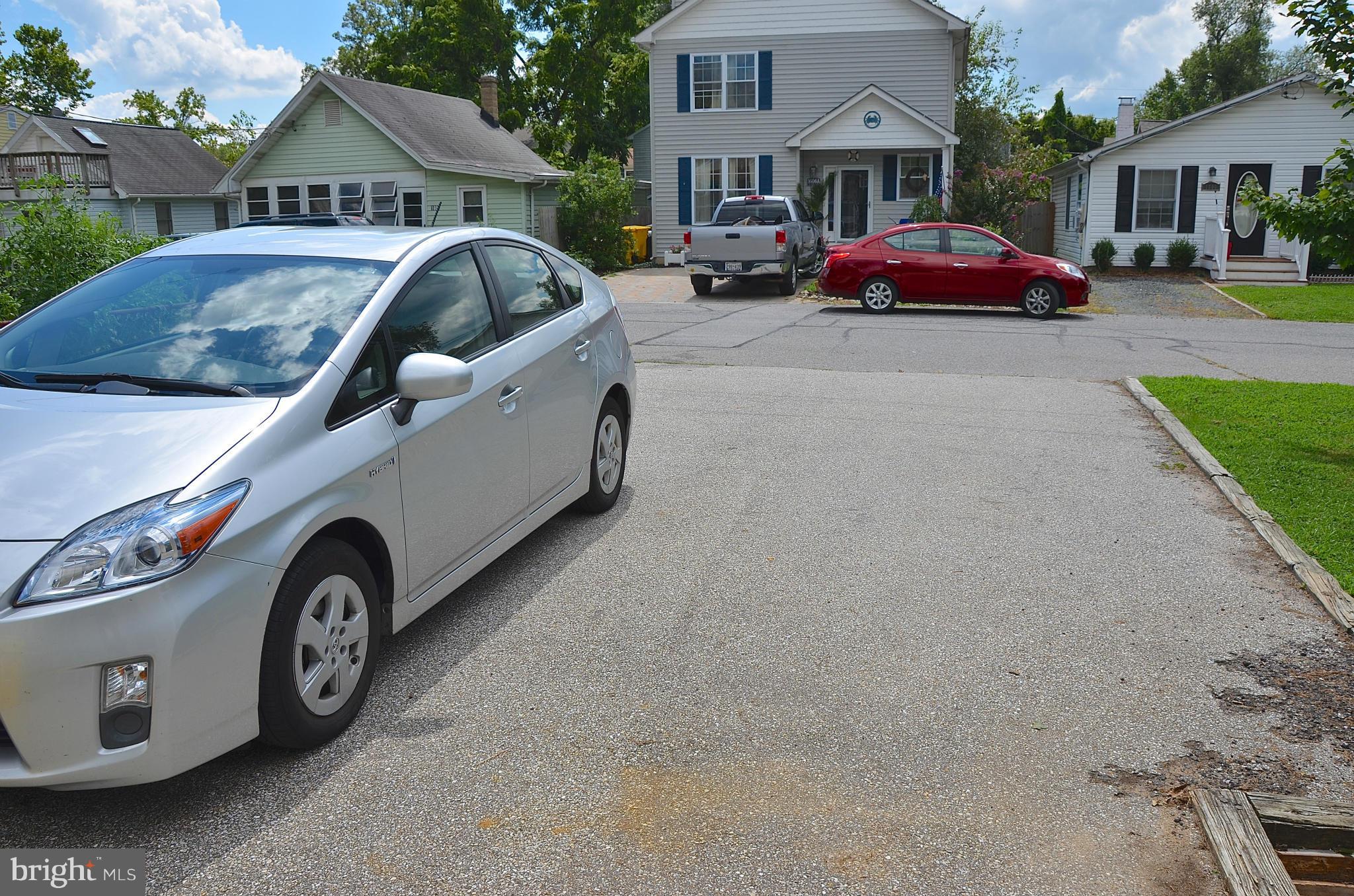 1607 Grange Road Edgewater, MD 21037 - Photo 28 of 30 a front view of a house with parking space