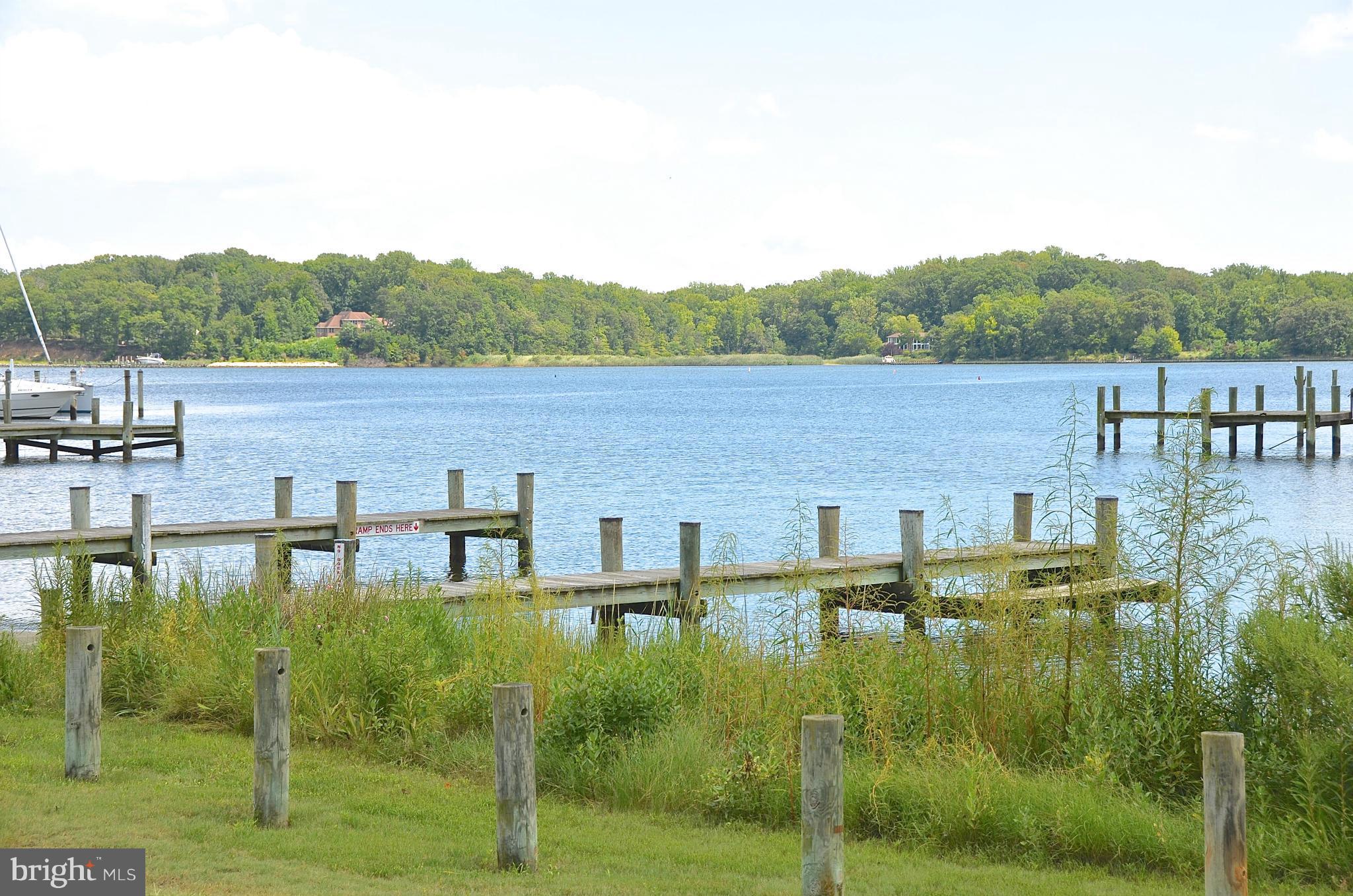 1607 Grange Road Edgewater, MD 21037 - Photo 29 of 30 a view of a lake with houses in the back