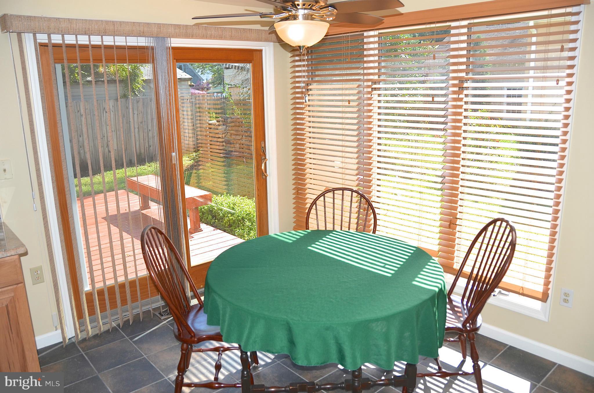 1607 Grange Road Edgewater, MD 21037 - Photo 8 of 30 a view of a dining room with furniture and a window