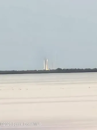 a view of water heater with a ceiling fan