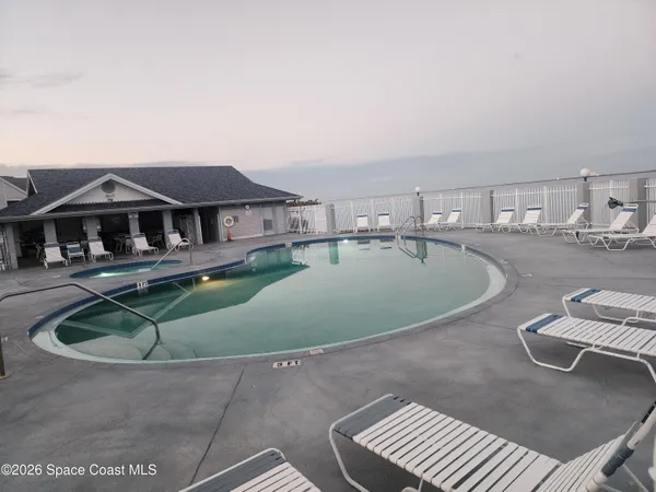 a dinning table in front of a building