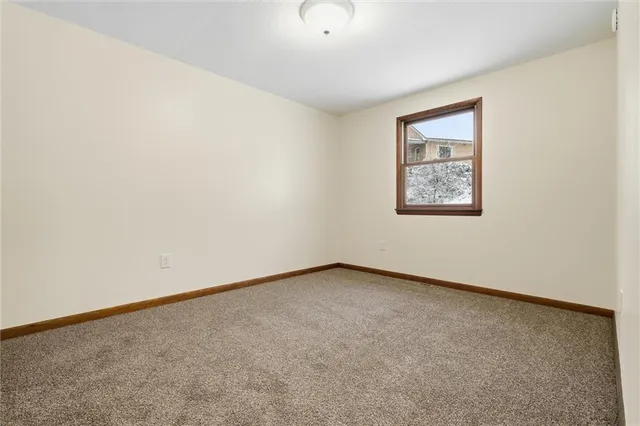 a view of hallway with closet