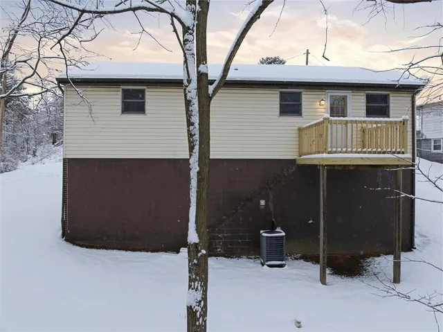 a front view of a house with garage