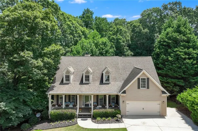 an aerial view of a house with a garden
