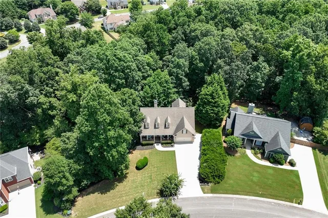 a view of a livingroom with furniture window and wooden floor