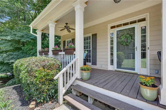 a living room with fireplace furniture and a flat screen tv