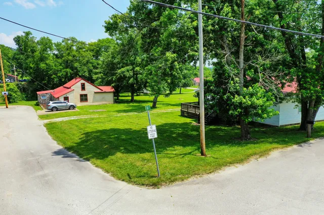 a view of a street with cars