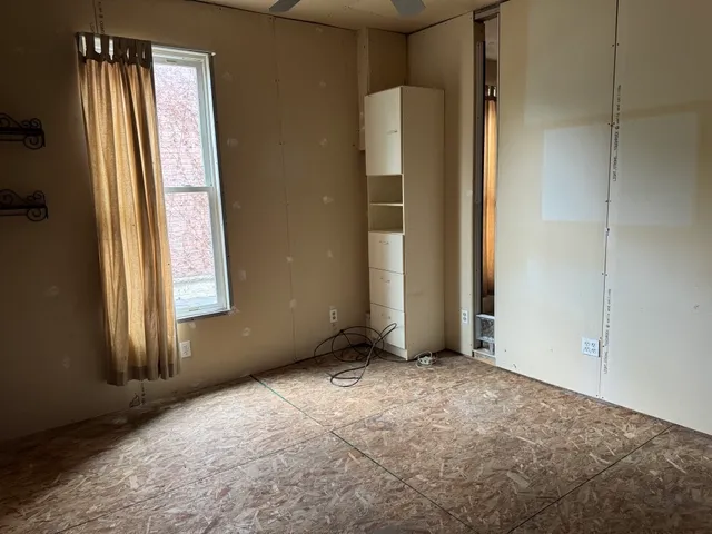 an empty room with windows