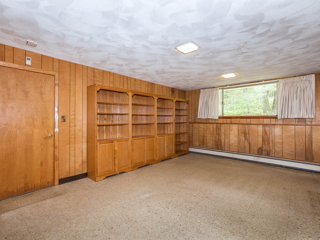 62 Turning Mill Road Lexington, MA 02420 - Photo 11 of 12 an empty room with a empty space and windows