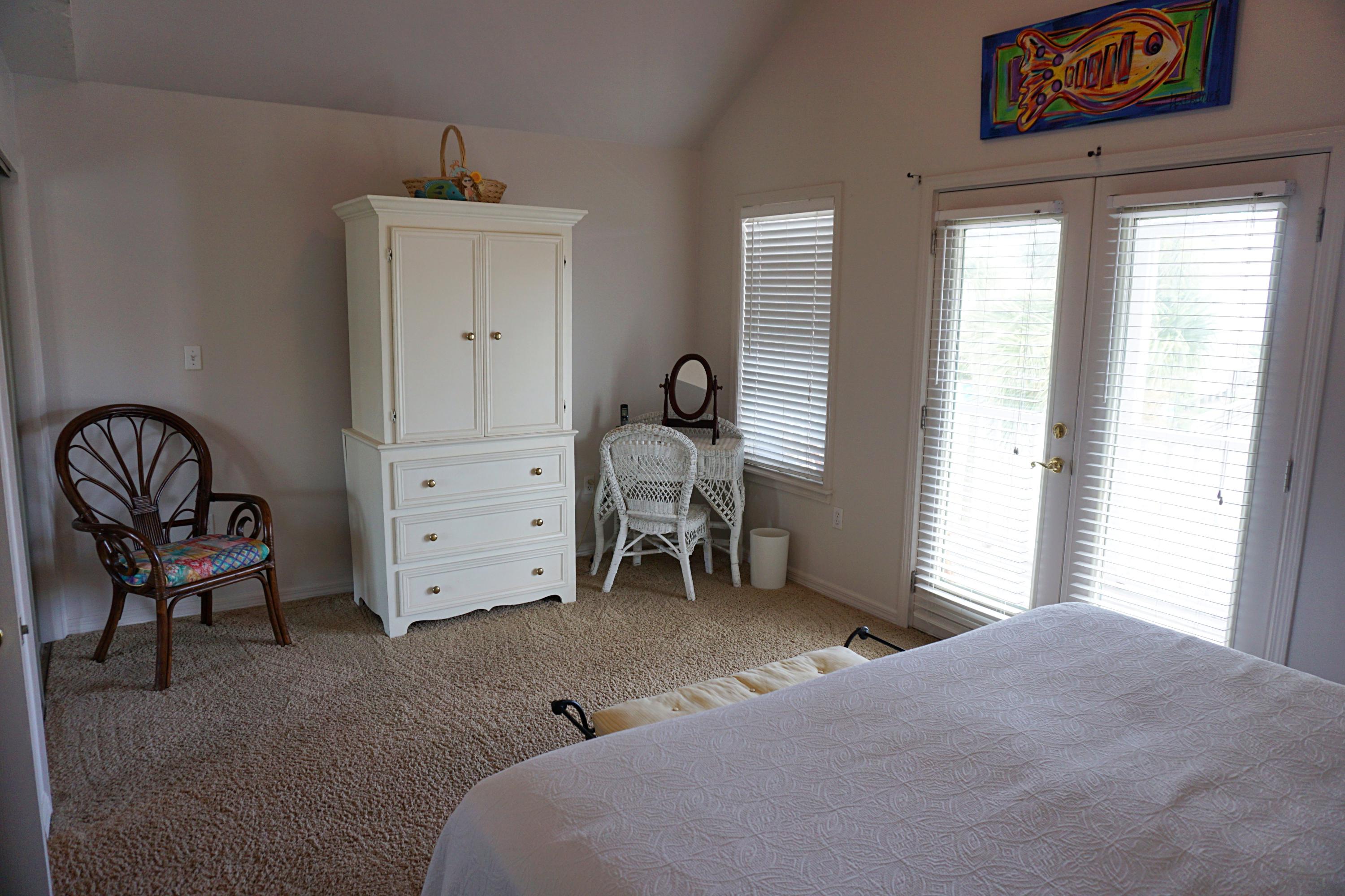 4944 West Co Highway Santa Rosa Beach, FL 32459 - Photo 12 of 24 a bedroom with a bed and a window