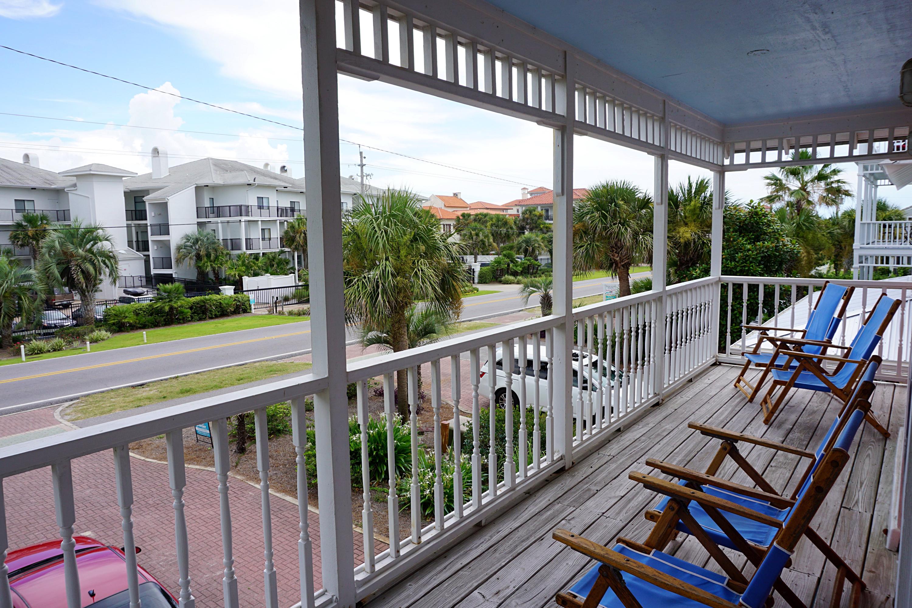 4944 West Co Highway Santa Rosa Beach, FL 32459 - Photo 14 of 24 a view of a balcony with chairs