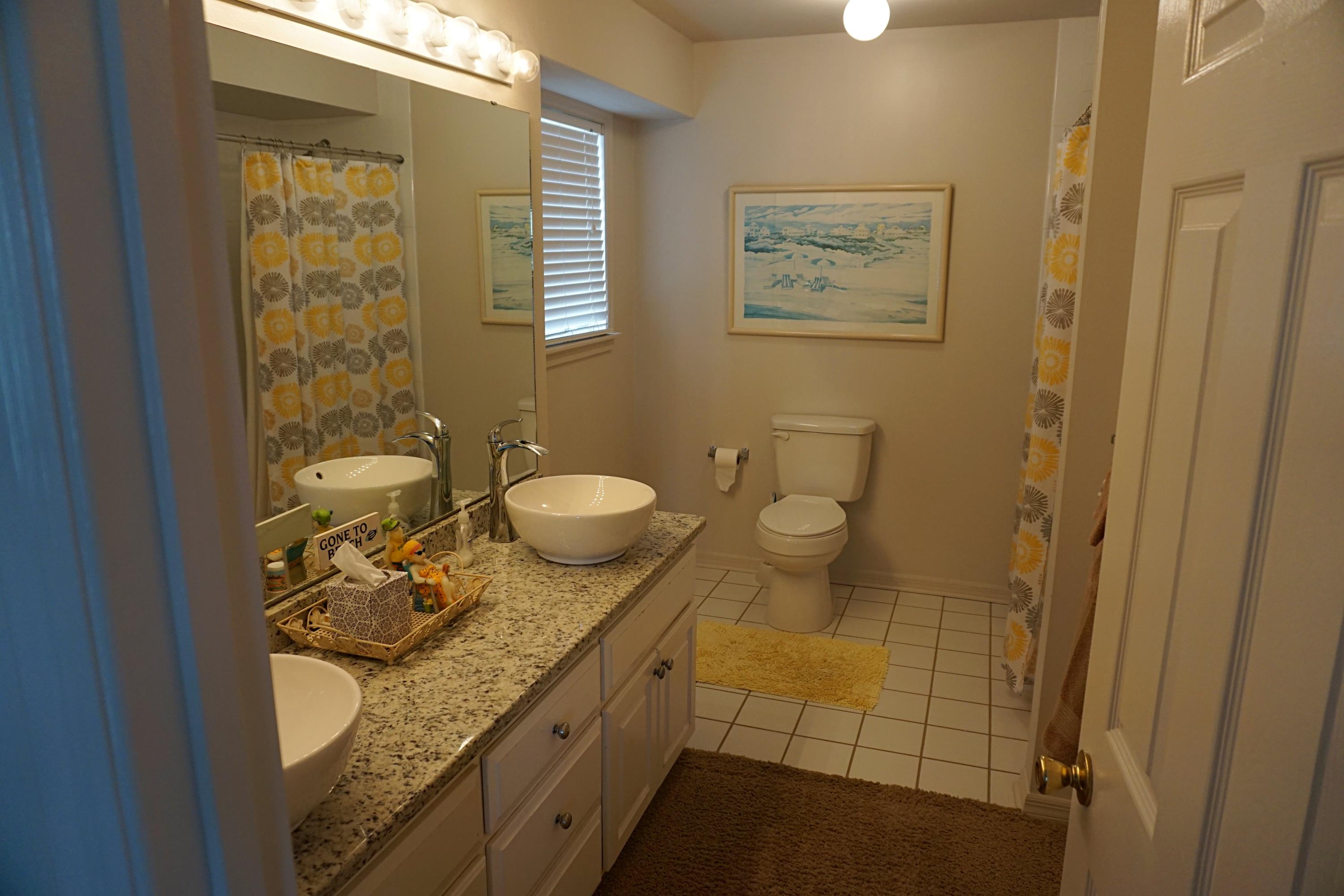 4944 West Co Highway Santa Rosa Beach, FL 32459 - Photo 15 of 24 a bathroom with a granite countertop sink toilet and shower