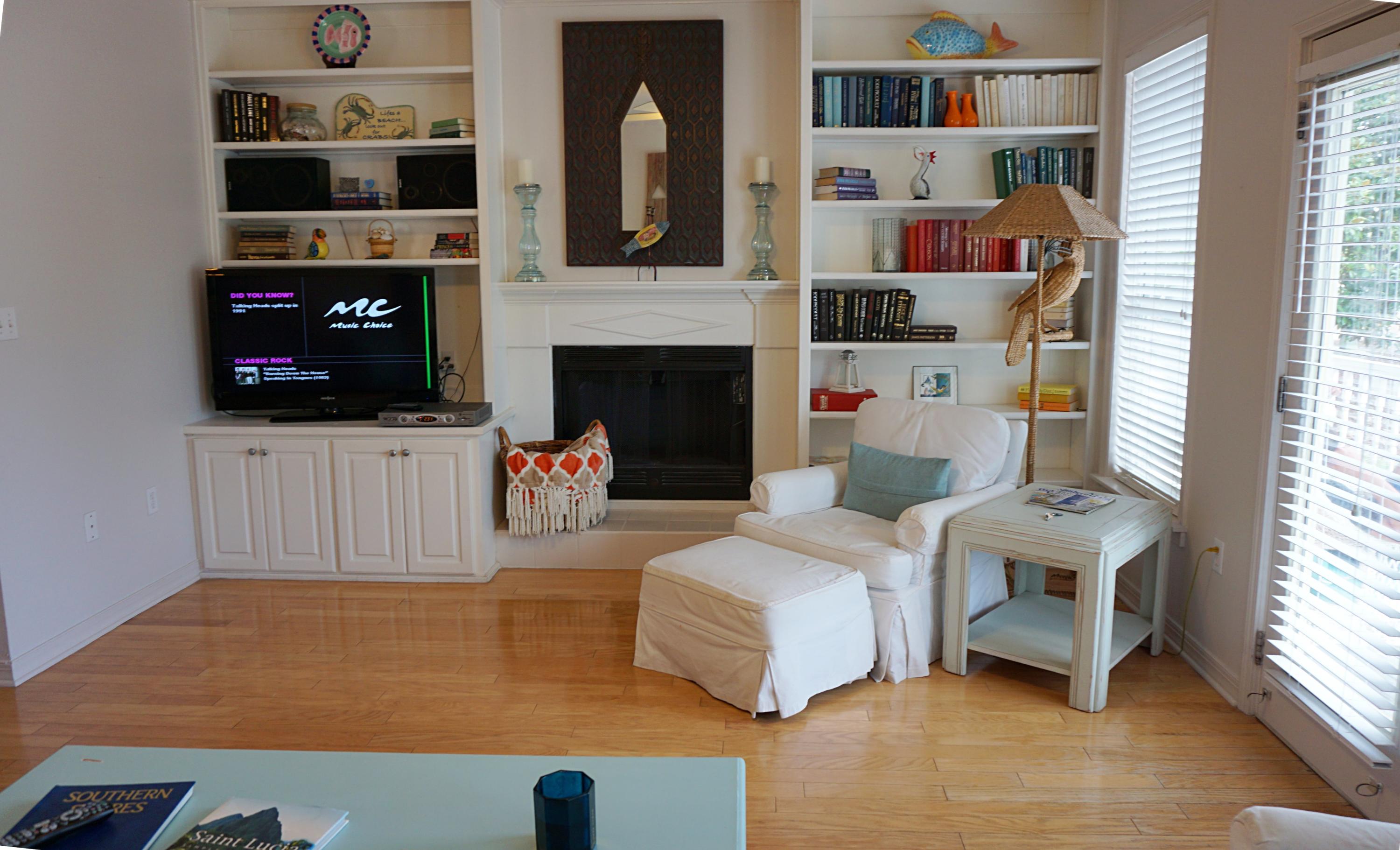 4944 West Co Highway Santa Rosa Beach, FL 32459 - Photo 22 of 24 a living room with furniture and a fireplace