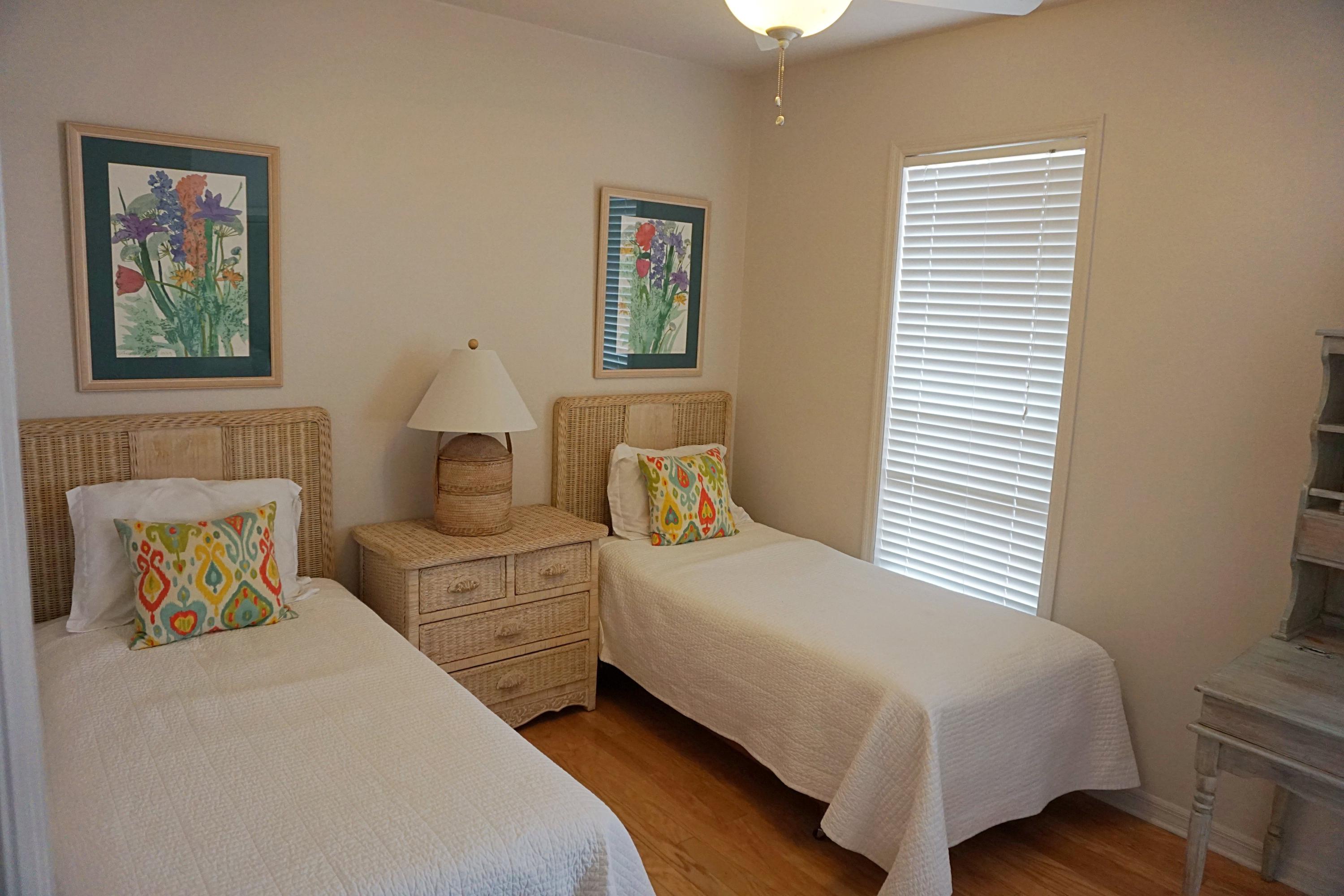 4944 West Co Highway Santa Rosa Beach, FL 32459 - Photo 23 of 24 a bedroom with a bed and a painting on the wall