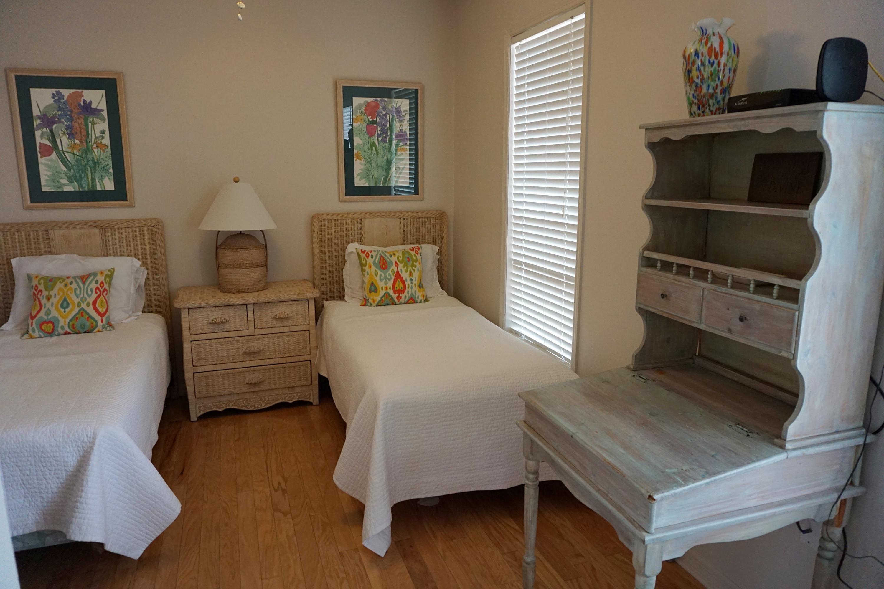 4944 West Co Highway Santa Rosa Beach, FL 32459 - Photo 24 of 24 a bedroom with a bed and a tv on the dresser