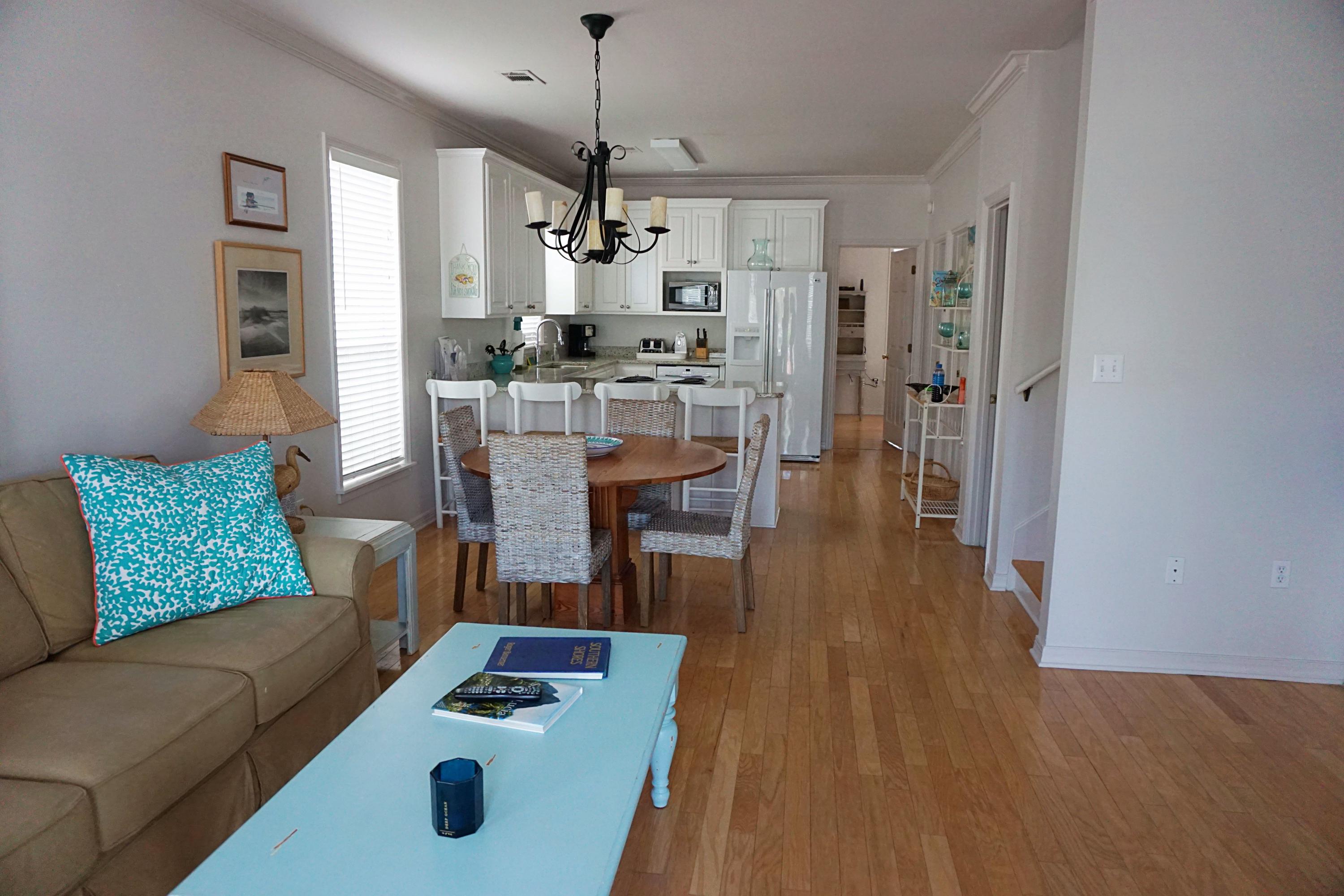 4944 West Co Highway Santa Rosa Beach, FL 32459 - Photo 4 of 24 a living room with kitchen island furniture and wooden floor