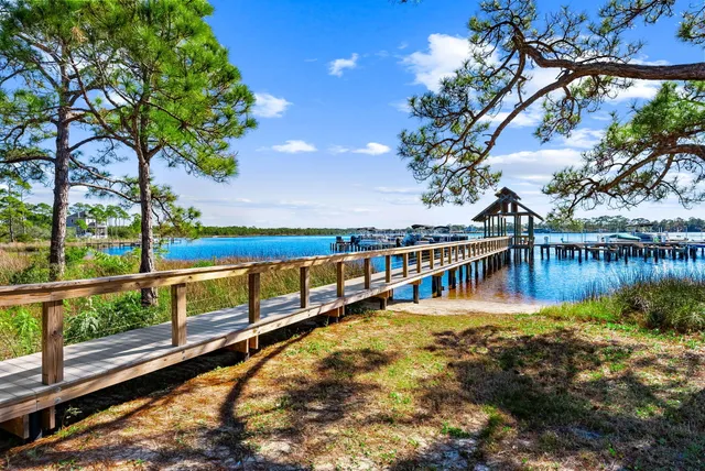 a view of a balcony with wooden floor