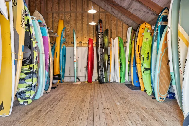 a view of swimming pool in front of house
