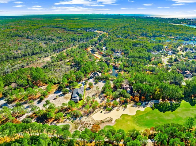 a view of a large yard with lots of green space