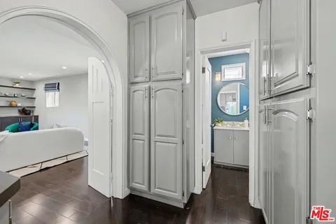 a bedroom with a bed and lamp