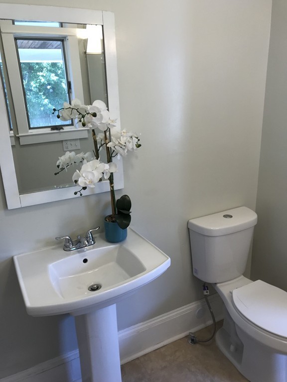 65 Grand Street Springfield, MA 01108 - Photo 27 of 30 a bathroom with a sink and a toilet