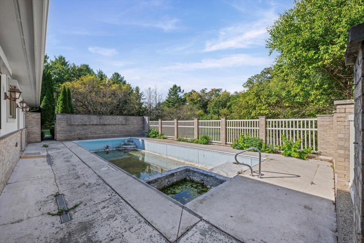 7510 East Tryon Grove Road Richmond, IL 60071 - Photo 11 of 63 a view of a backyard with wooden fence