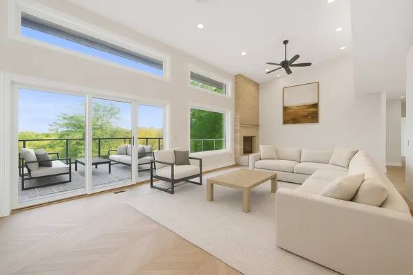 a kitchen with stainless steel appliances granite countertop a sink and wooden cabinets