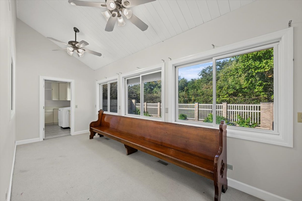 7510 East Tryon Grove Road Richmond, IL 60071 - Photo 20 of 63 a large bed sitting in a room next to a window