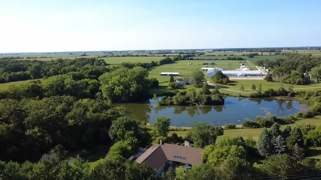 an aerial view of city and lake