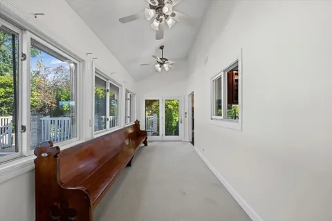 a view of a livingroom with furniture and workspace